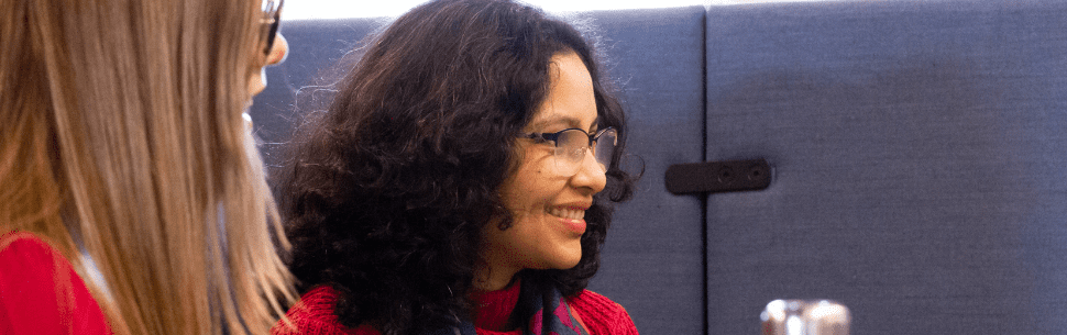 Female colleague smiling at Hackathon event